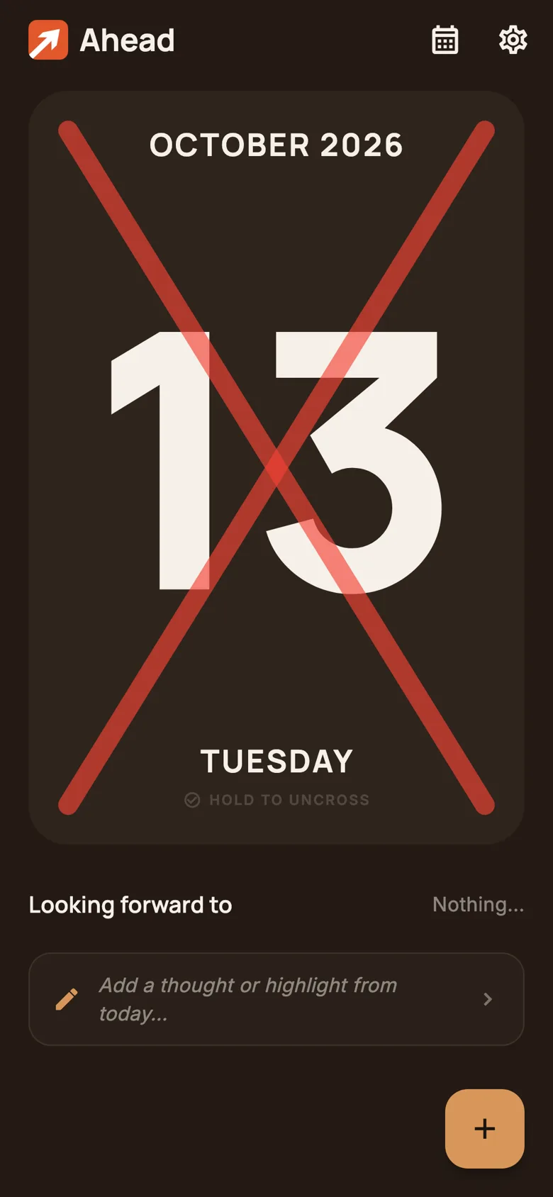 A day page in dark mode with October 14 crossed off by a large red X.